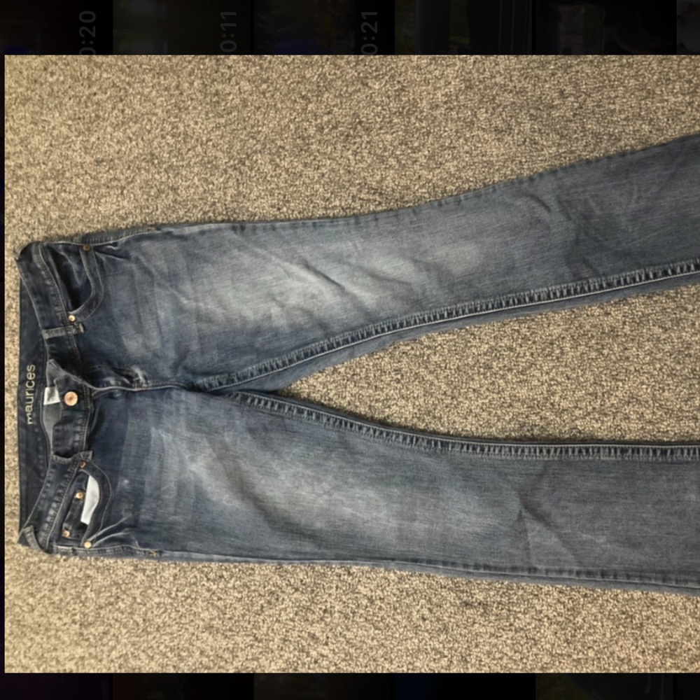 Faded boot cut jeans.